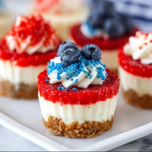 Red, White and Blue Mini Cheesecakes decorated with festive toppings